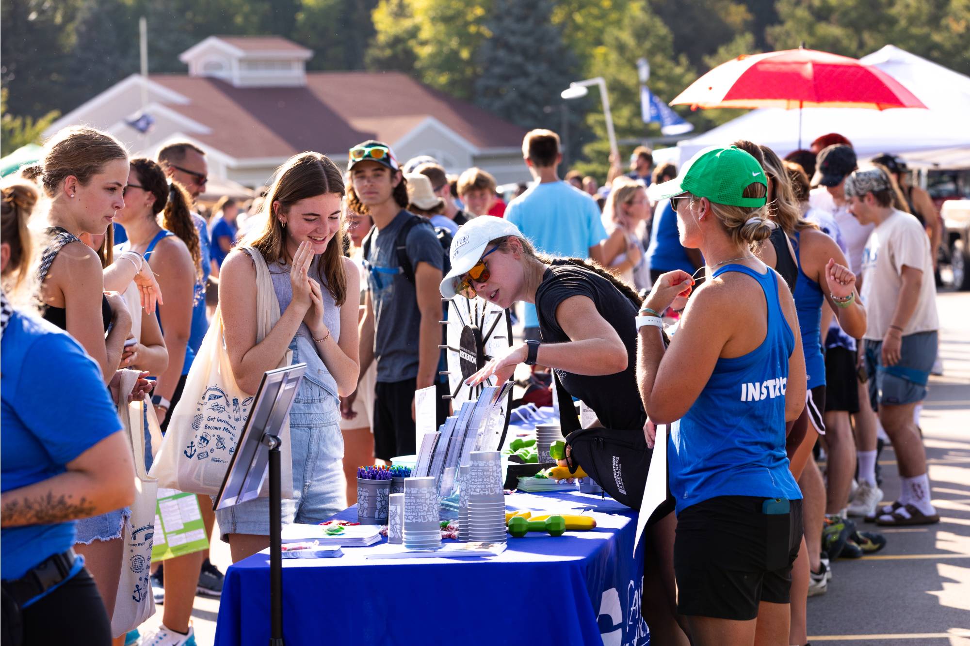 Students talking to staff at Campus Life Night
